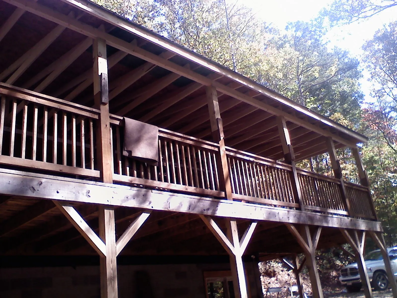 Timber framing under a new elevated porch and deck — Roof Leak Repair in Wisconsin Rapids by Roofing Brothers